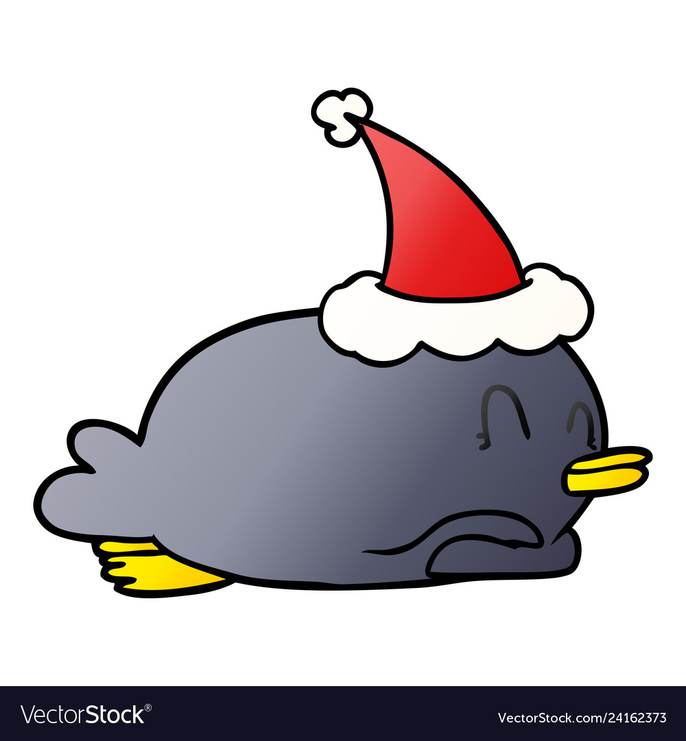 Penguin lying on belly wearing santa hat