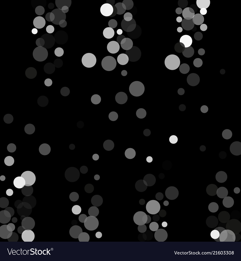 Silver glitter confetti on a black background