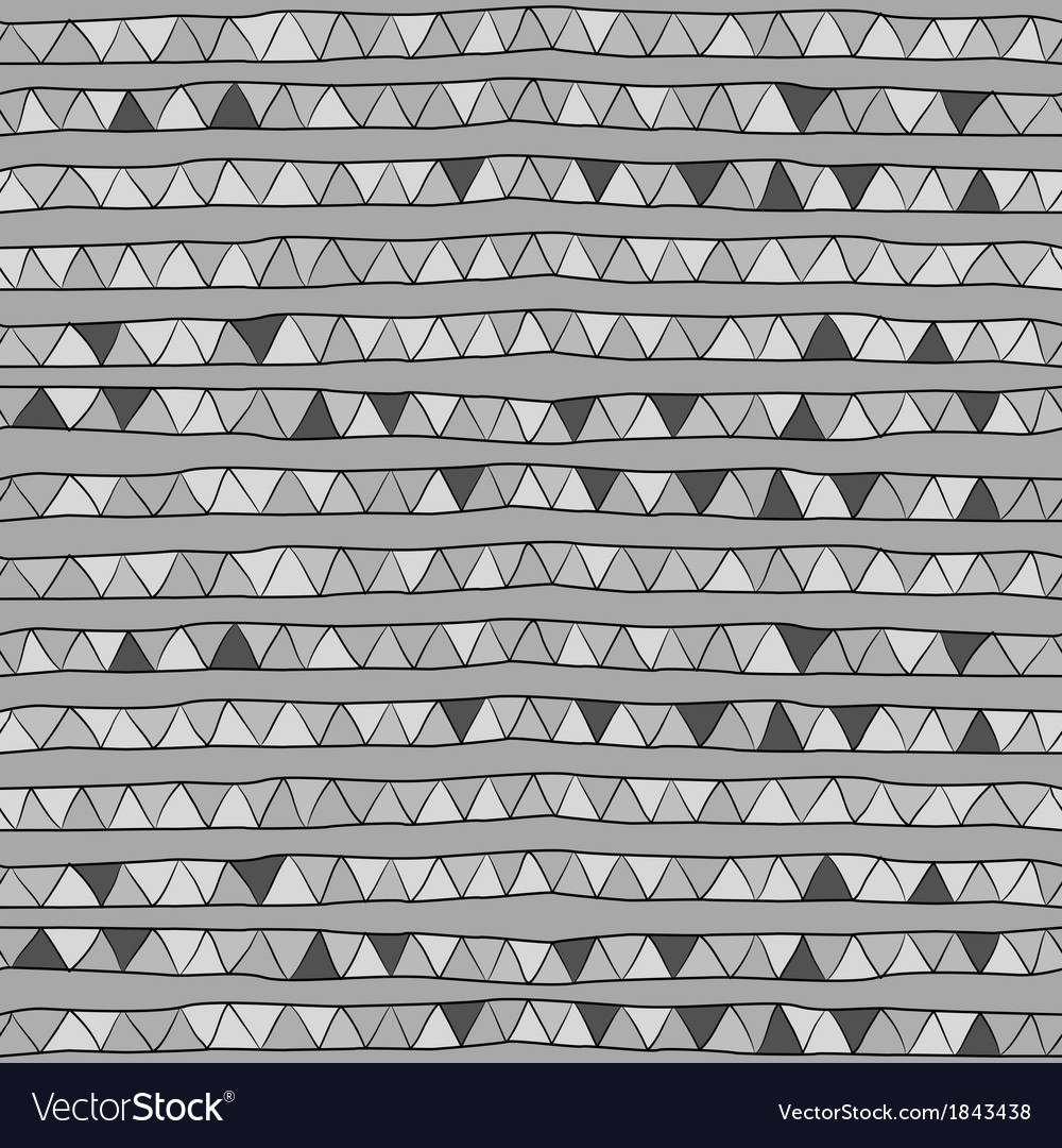 Monochrome pattern of triangles on a gray backgr