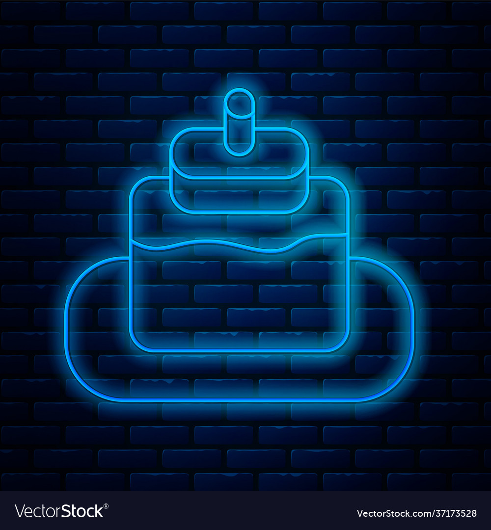 Glowing neon line cake icon isolated on brick wall