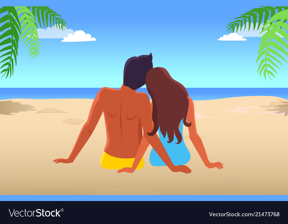 Couple sits on beach and looks at blue deep ocean