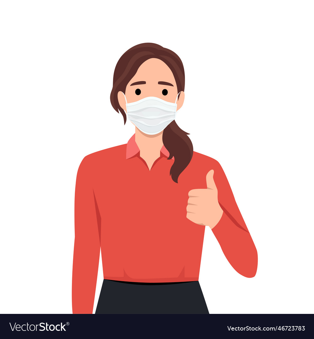 Happy young woman wearing medical face mask