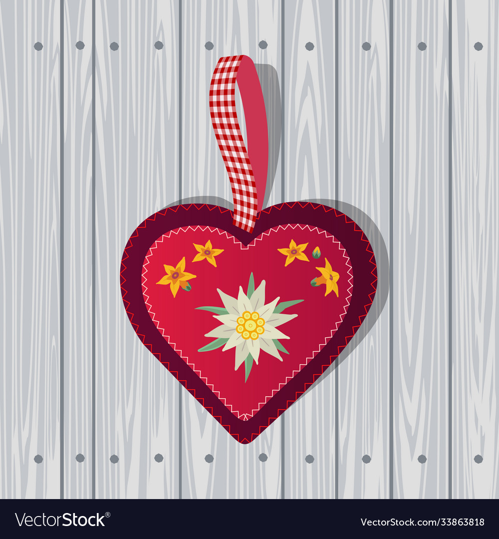 Hand drawn edelweiss in red heart on wooden Vector Image