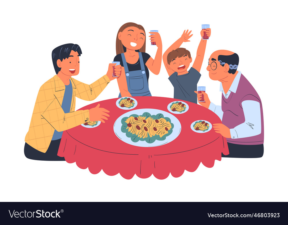 Happy family sitting at table eating festive