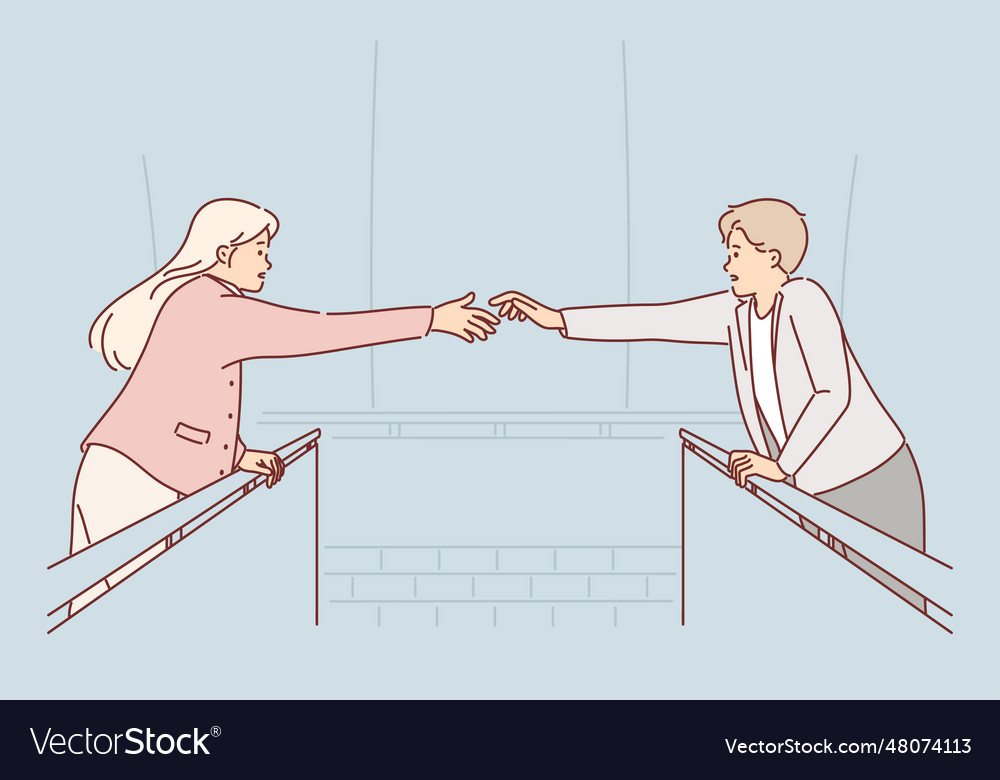 Loving couple stands on opposite sides of bridge