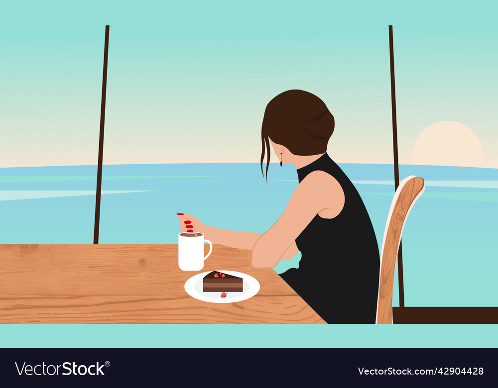 Woman sitting at window in cafe