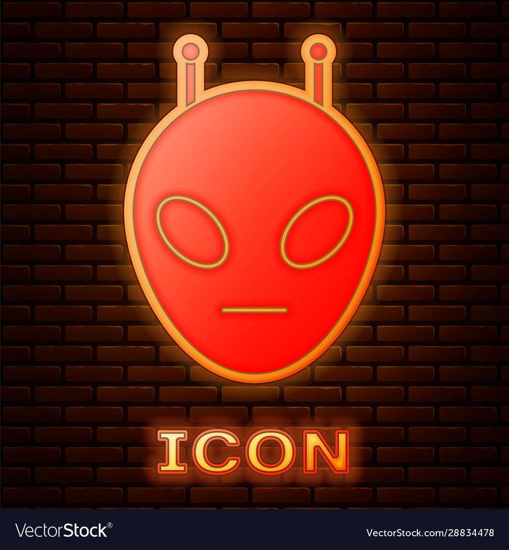 Glowing neon alien icon isolated on brick wall