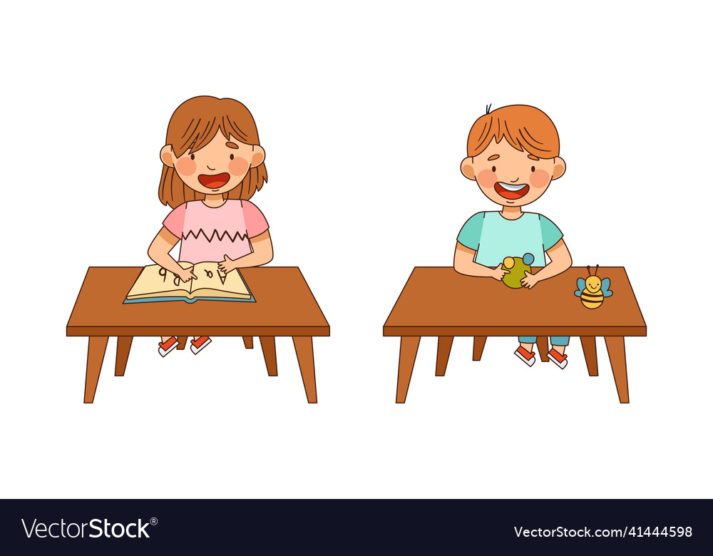 Little boy and girl in kindergarden at table Vector Image