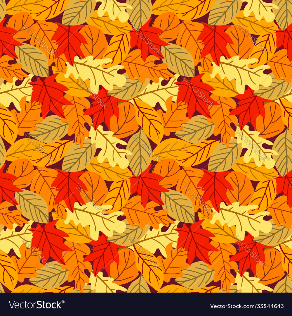 Seamless pattern with many colored autumn leaves