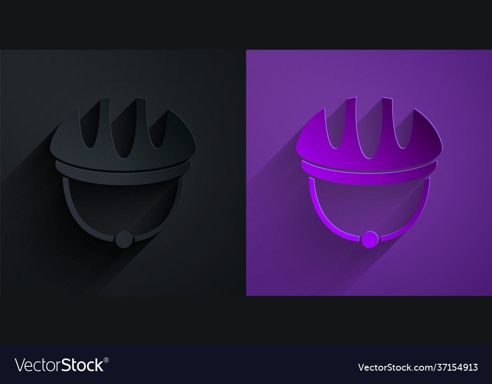 Paper cut bicycle helmet icon isolated on black