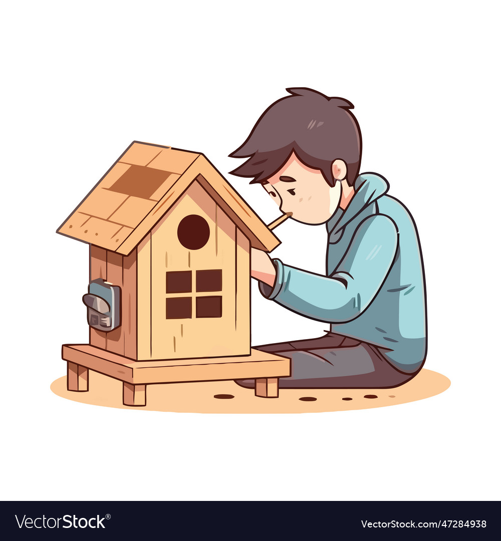 Small boy playing with wooden house