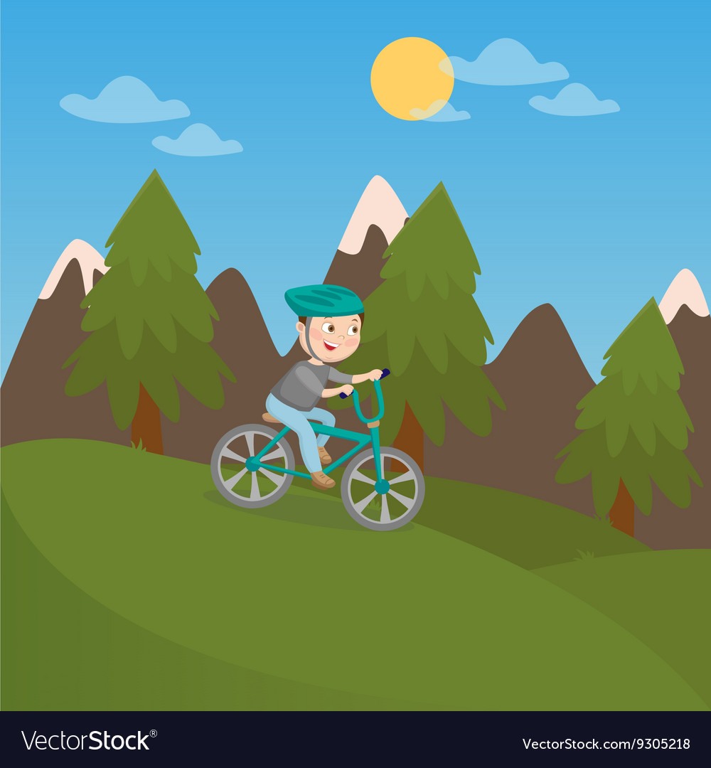 Happy boy riding bicycle in mountains