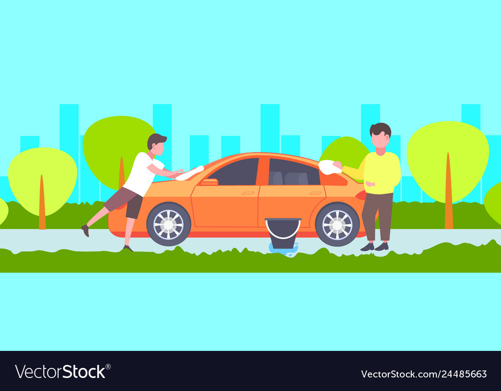 Little son helping his father washing car outdoors