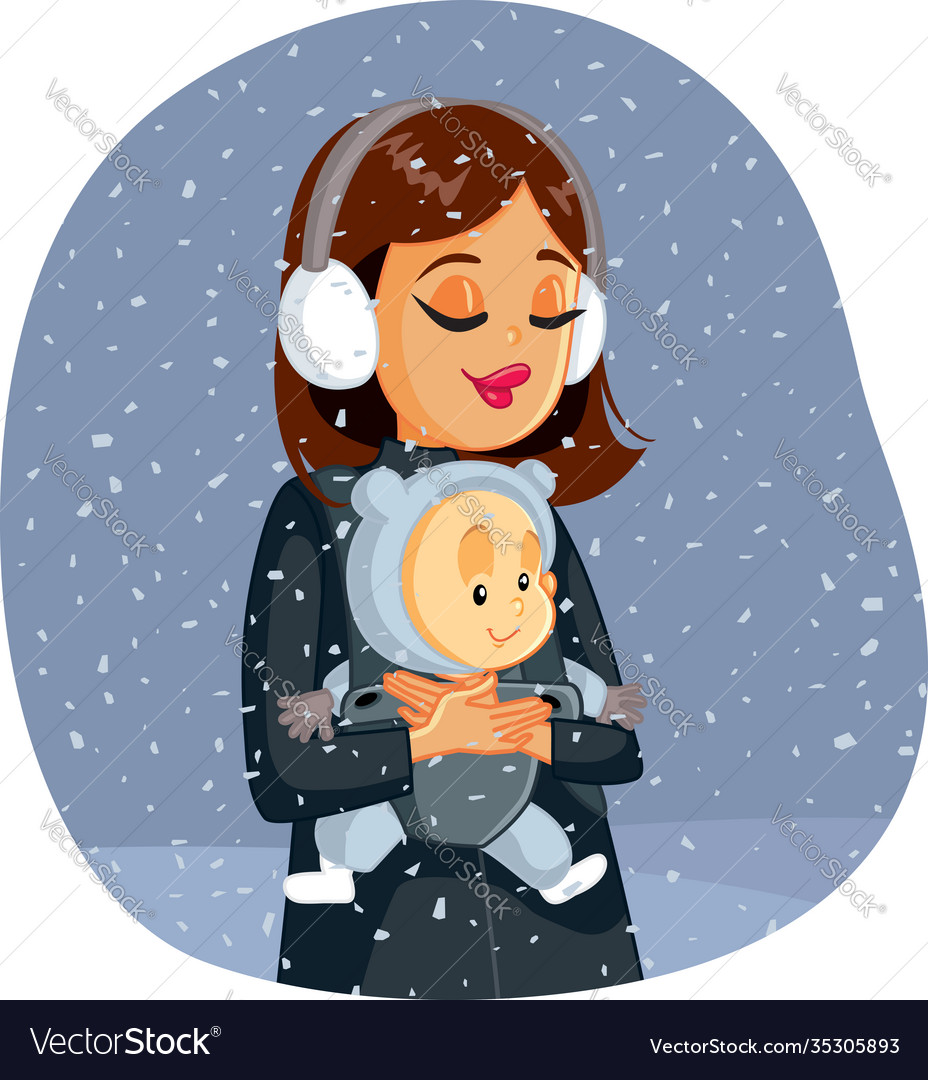 Mother and baenjoying winter snow