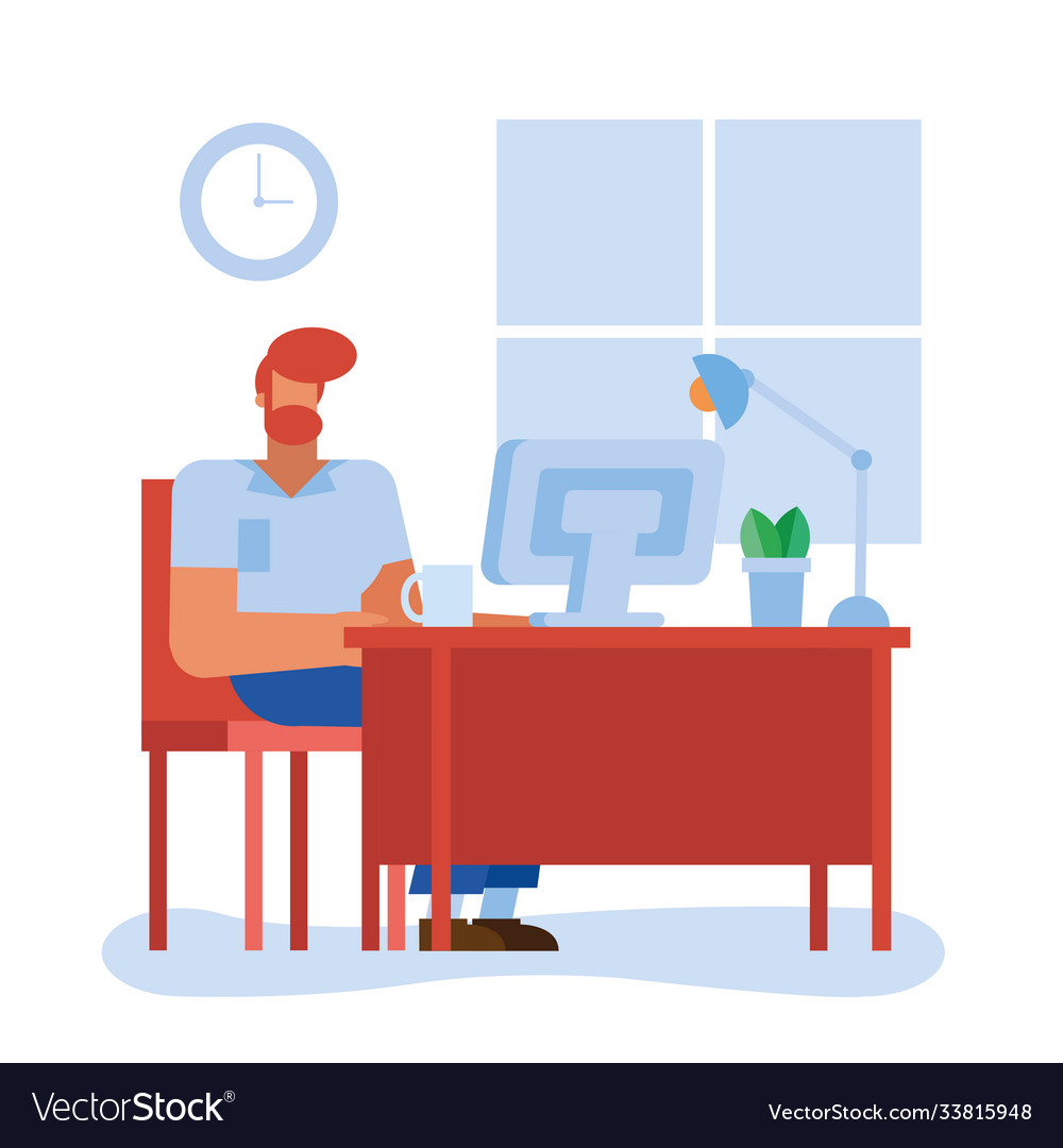 Man at desk with computer in office