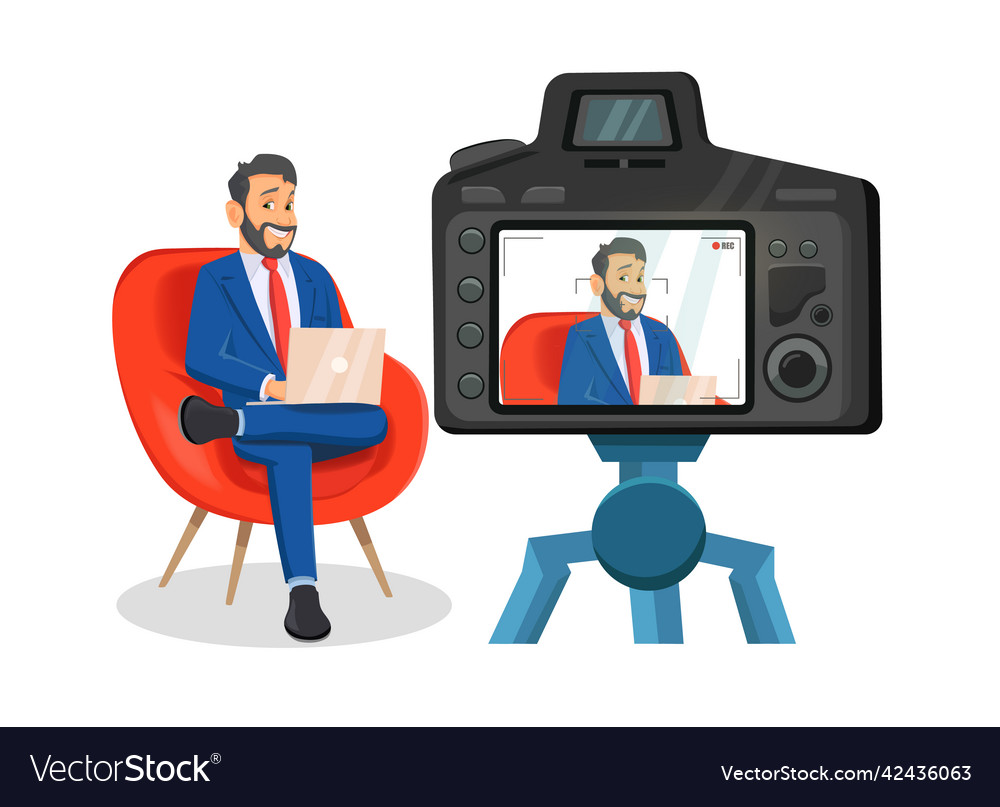 Man blogger tells something in front of camera