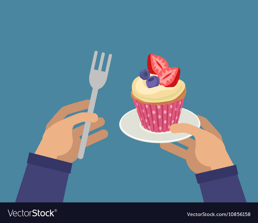 Hands with cupcake and fork