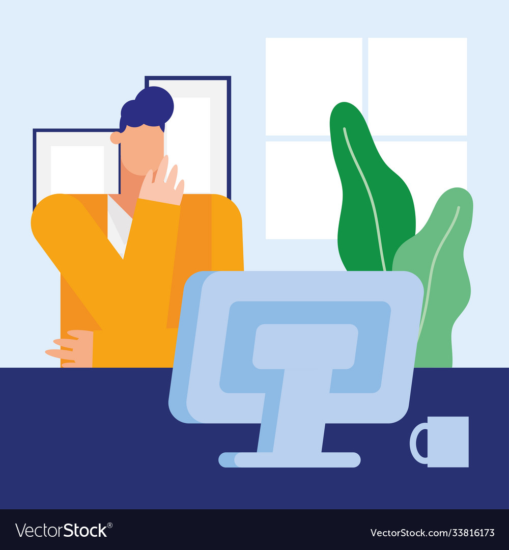 Man at desk with computer in office