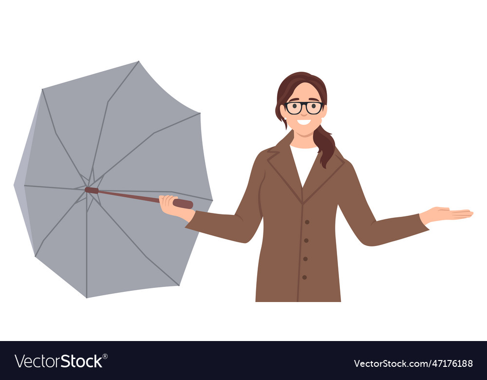 A woman with an open umbrella in her hands