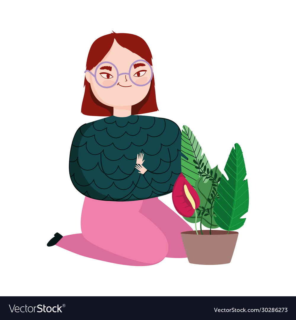 Young woman on knees with potted plant