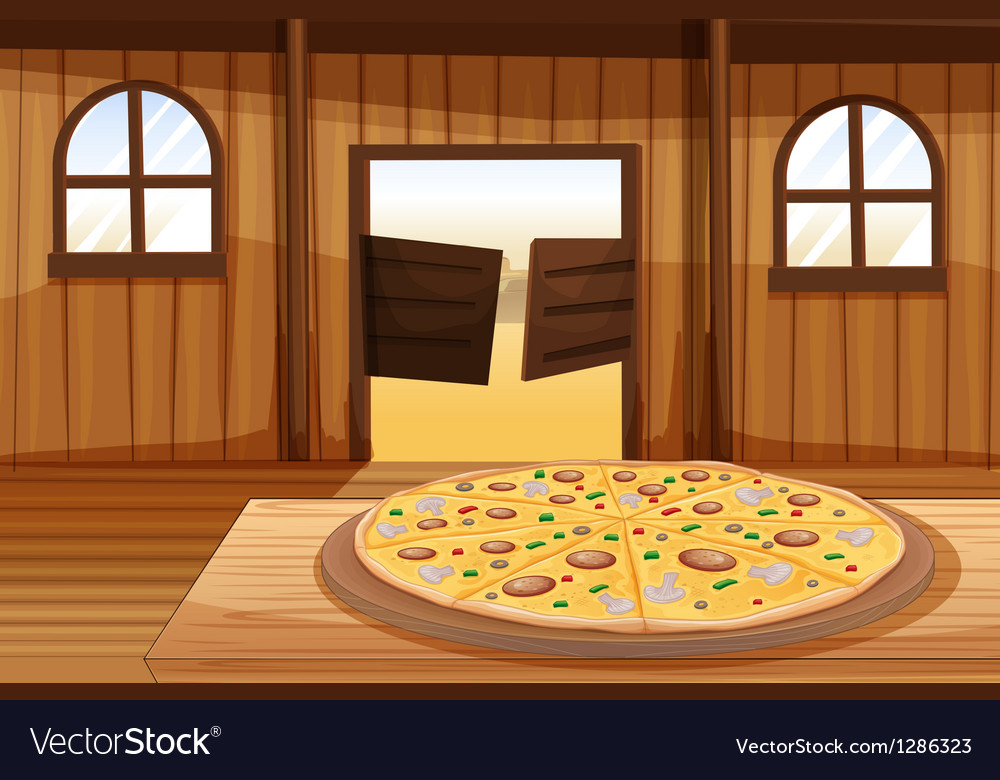 A pizza pie in the table