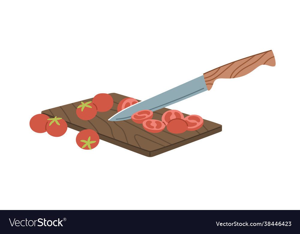 Cutting cherry tomatoes into pieces with sharp