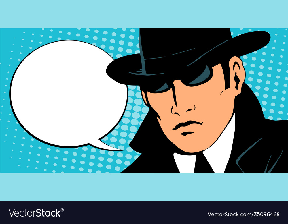 Man detective in a retro hat and coat