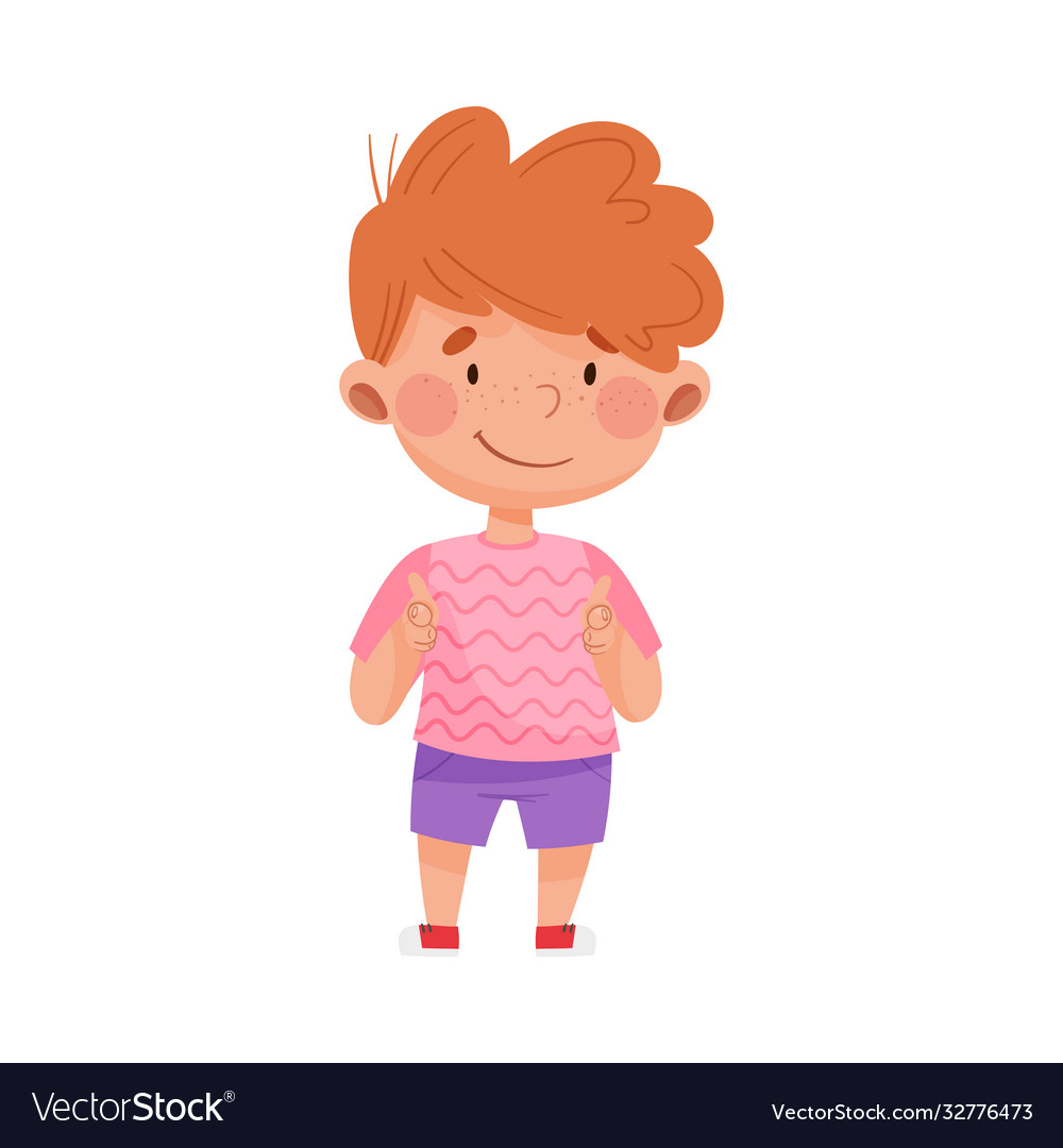 Smiling Red-Haired Boy Pointing