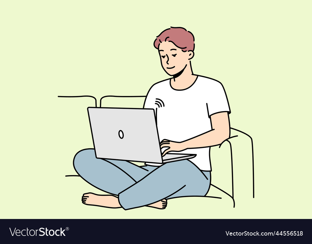 Man Using Laptop on Couch