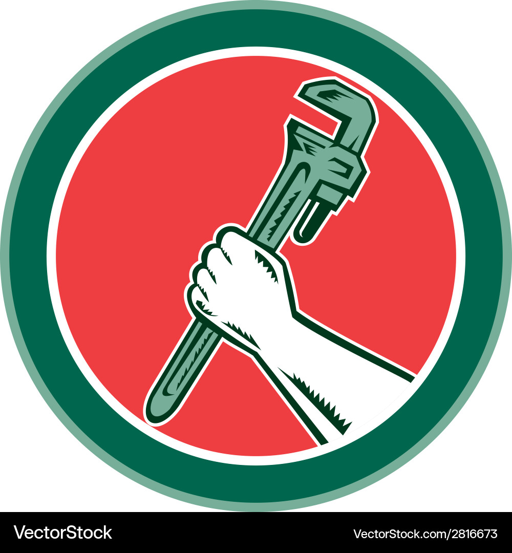 Hand holding adjustable wrench circle woodcut Vector Image