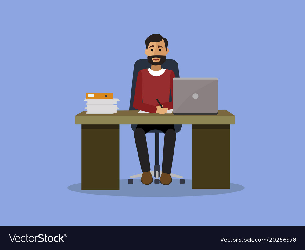 A man is working at computer in his office