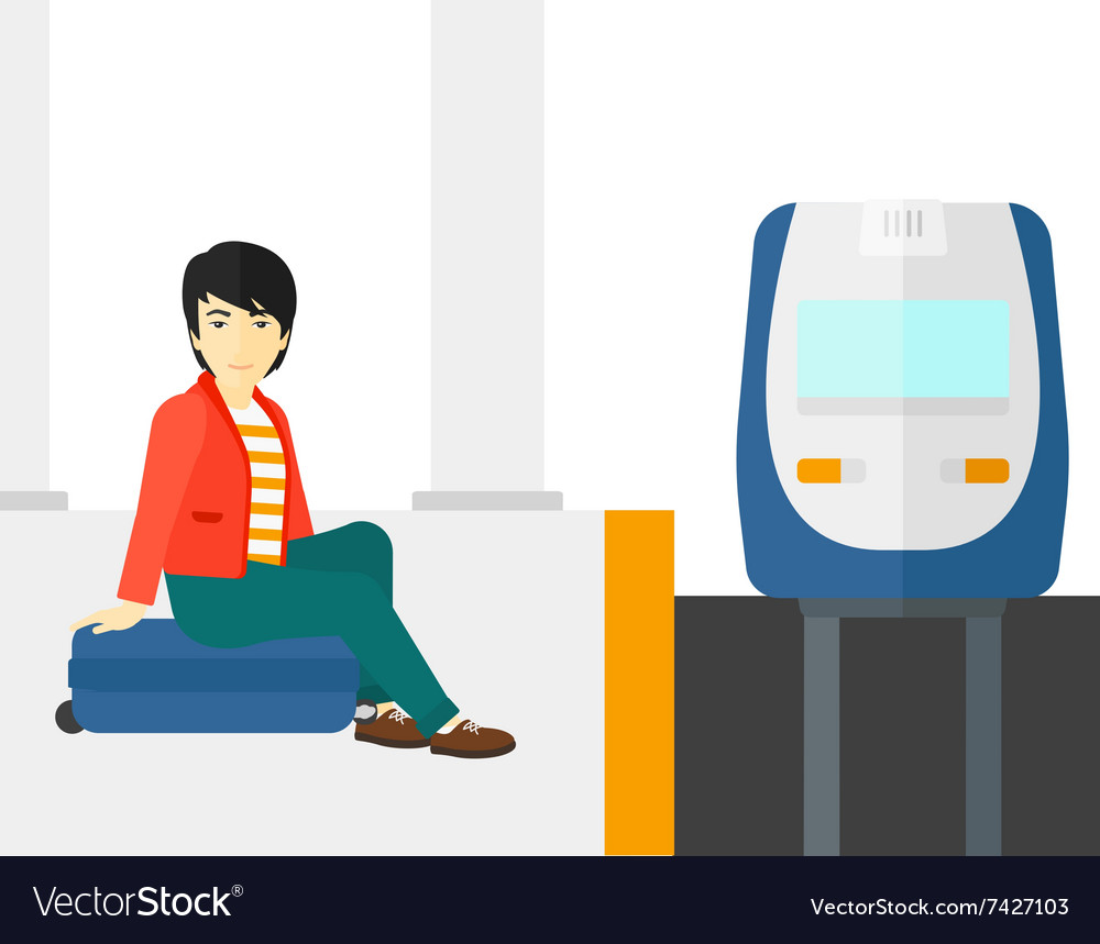 Man sitting on railway platform