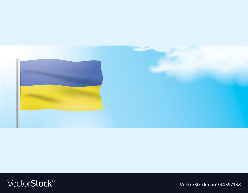 Ukraine flag waving on a blue sky background