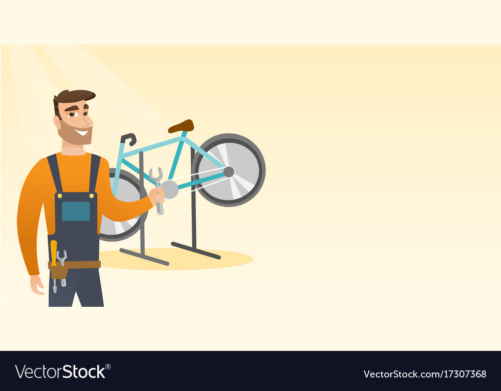 Caucasian bicycle mechanic working in repair shop