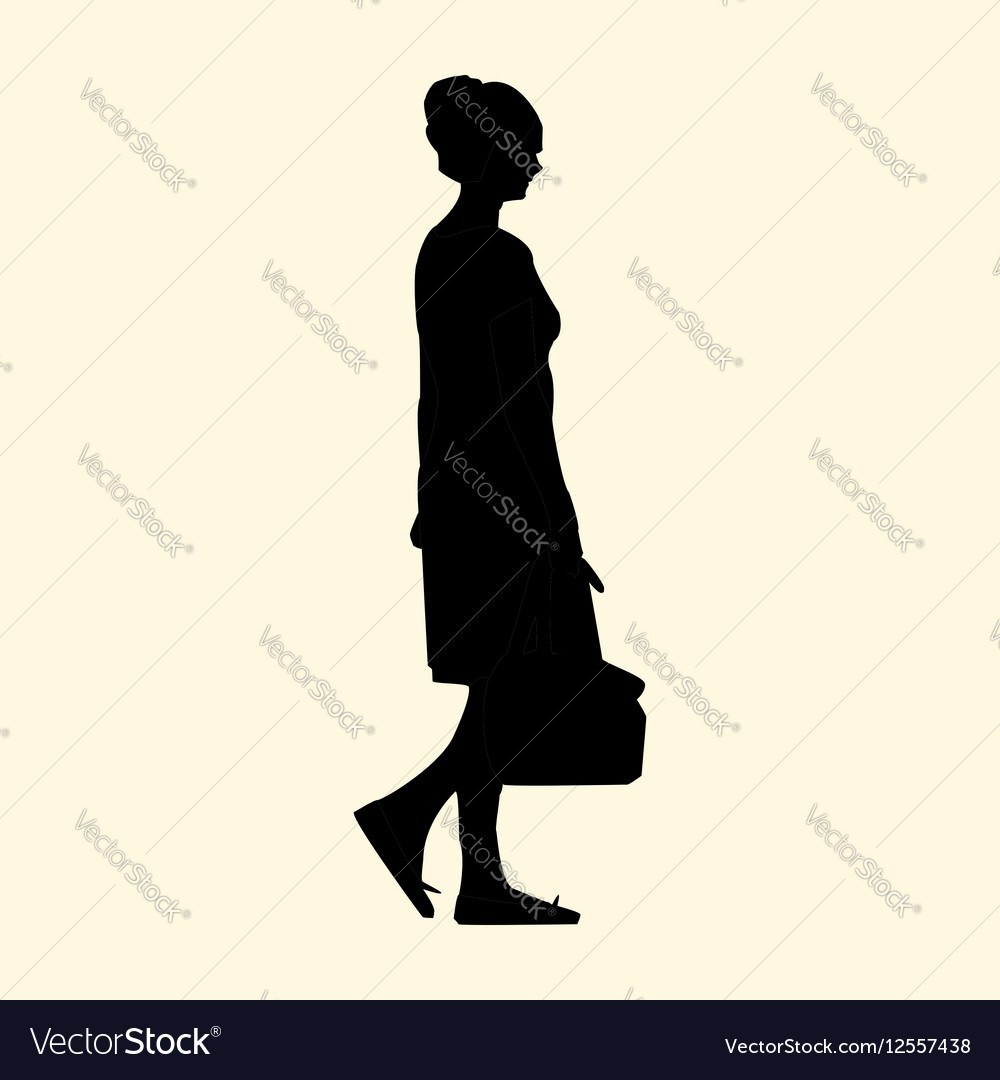 A silhouette of girl with bag walks