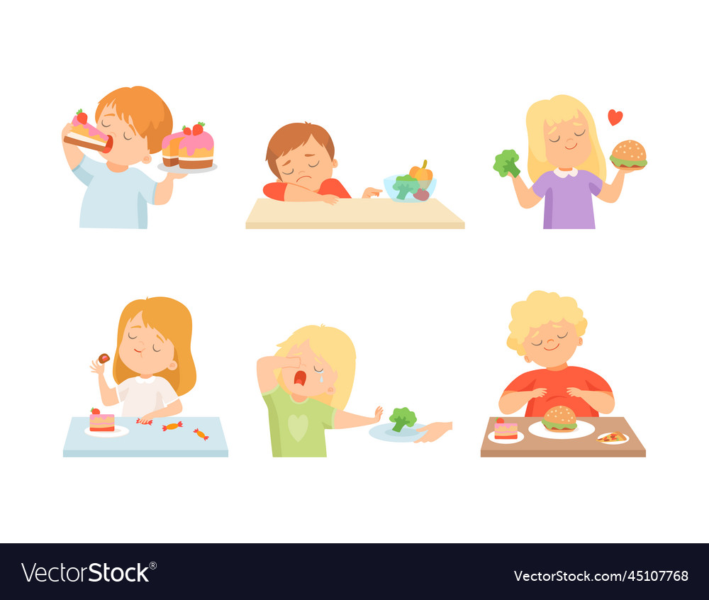 Little kids at table with vegetables and sweets