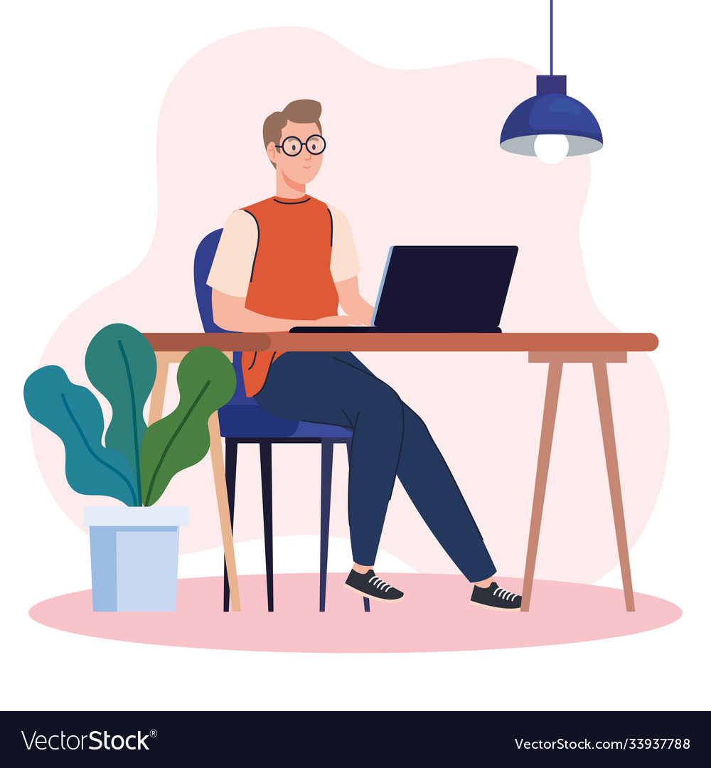 Young man using laptop computer on desk working