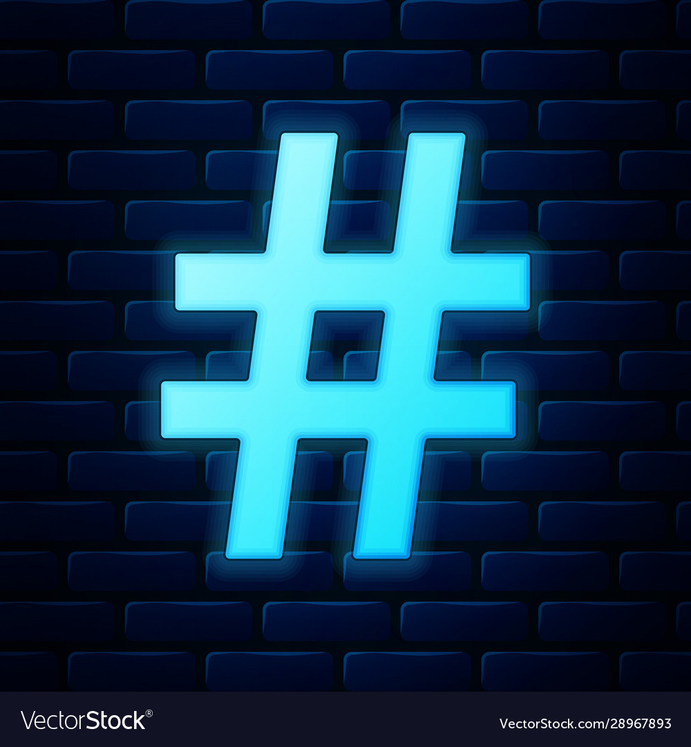 Glowing neon hashtag icon isolated on brick wall