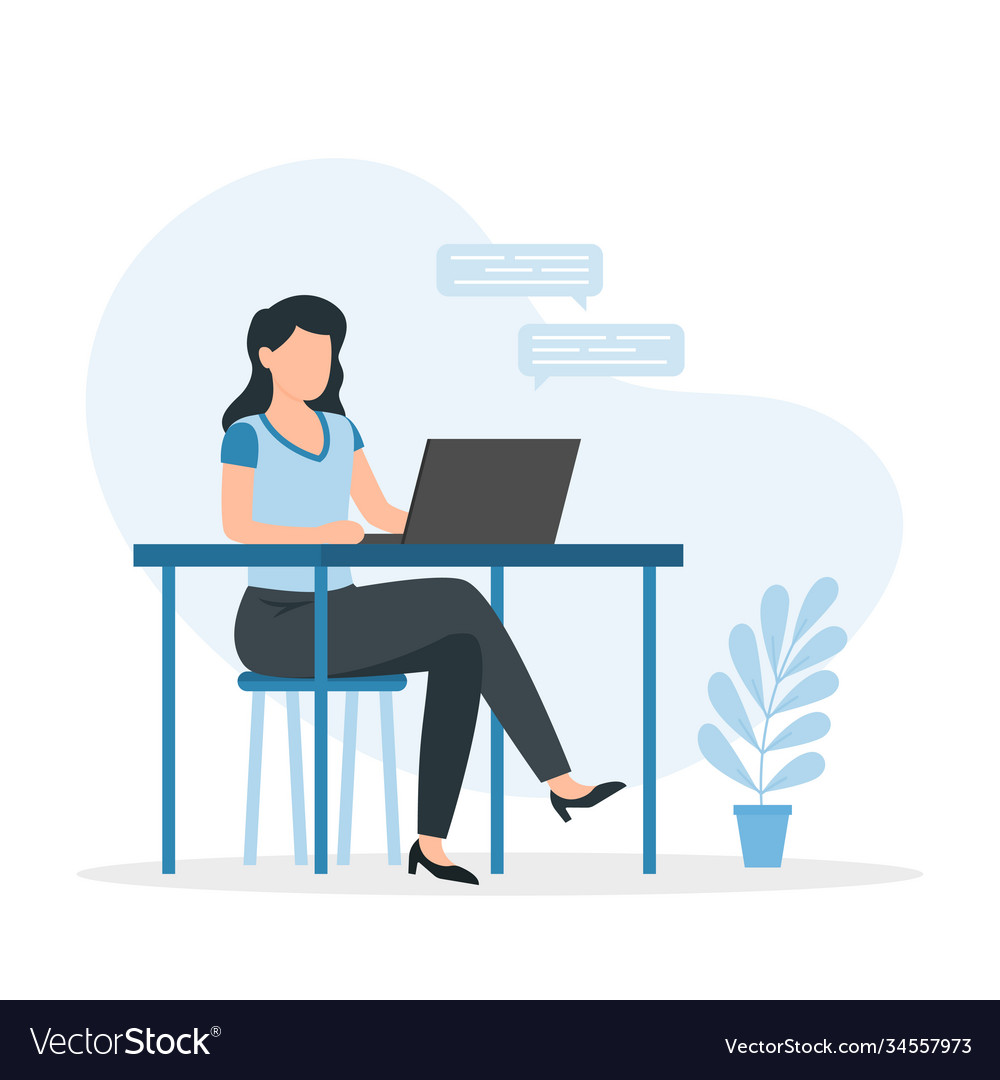 Woman Working on Laptop at Desk
