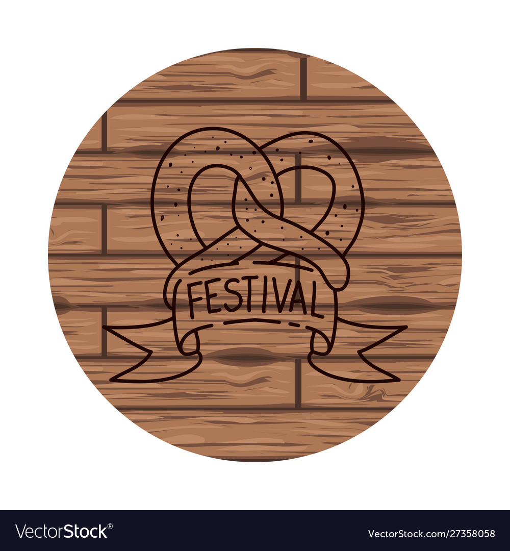 Delicious pretzel with wooden background