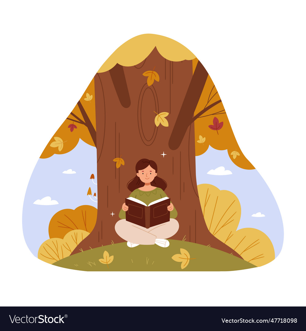 A girl is reading book under an autumn tree