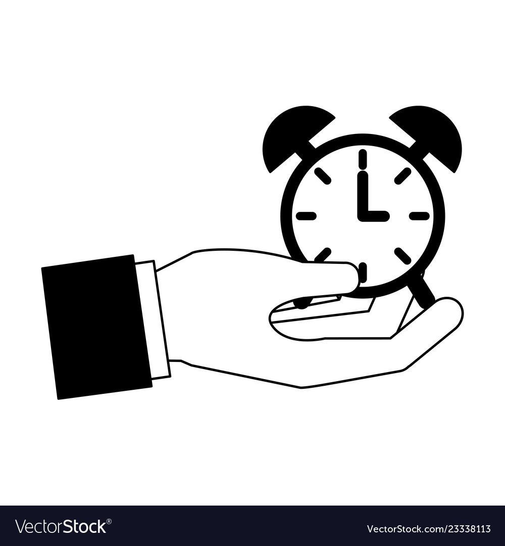 Hand holding clock alarm time