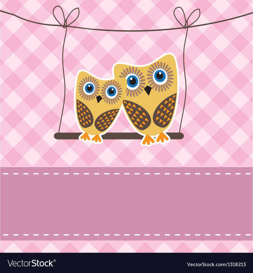 Two cute owls on the tree branch