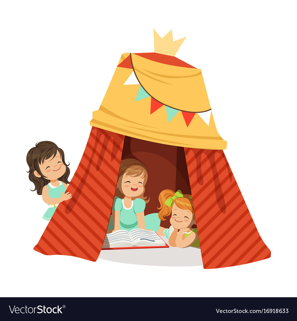 Cute little girls sitting in a homemade teepee