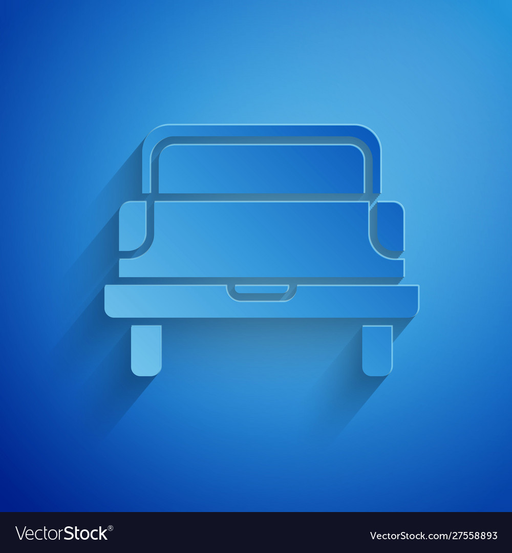 Paper cut pickup truck icon isolated on blue