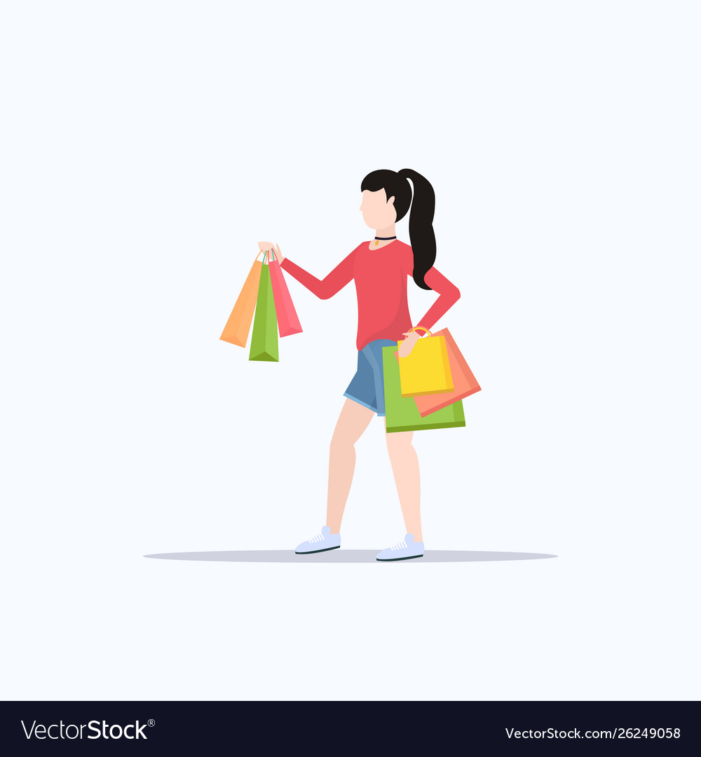 Woman holding colorful paper bags young girl