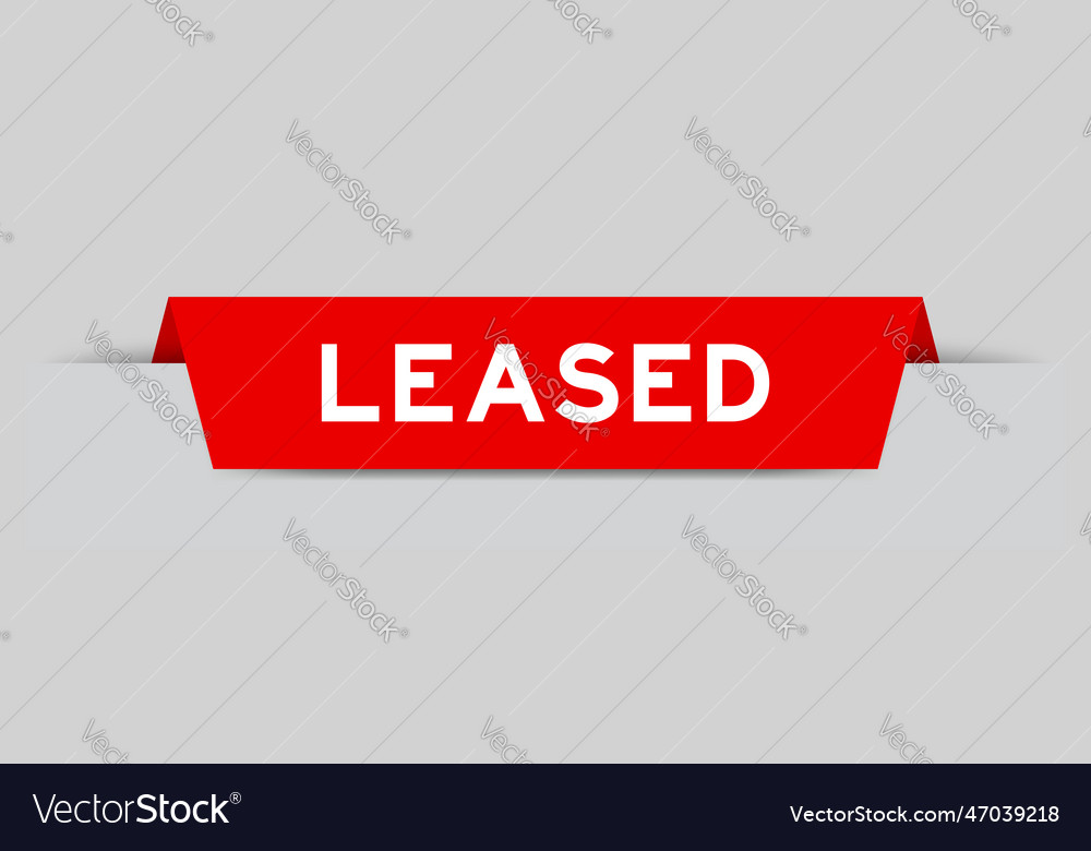 Red color inserted label with word leased on gray