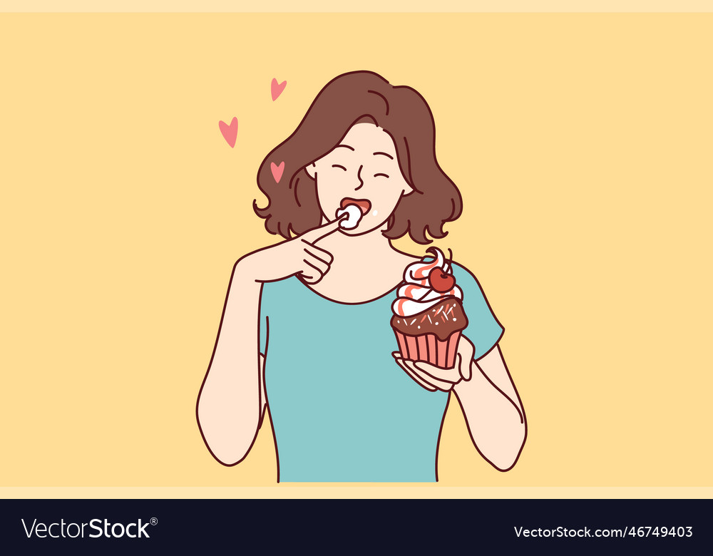 Woman eats delicious cupcake licking sweet cream Vector Image