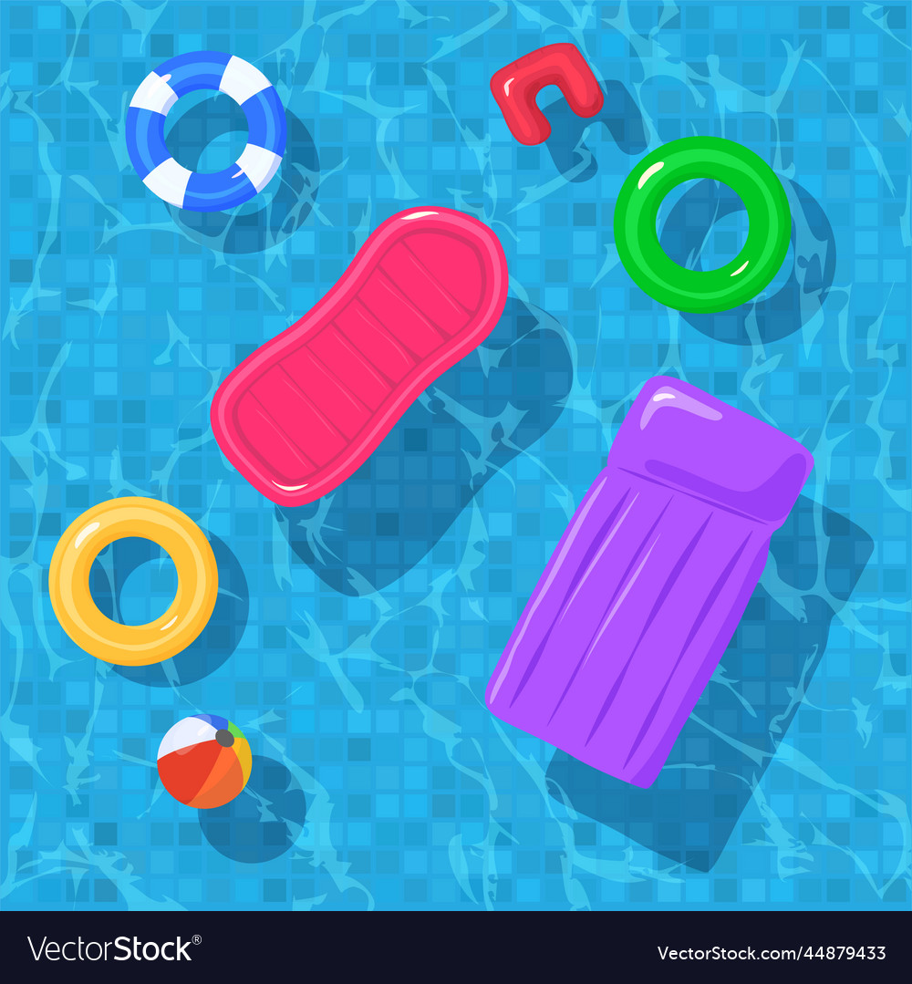 Top view of water in pool with floating rings