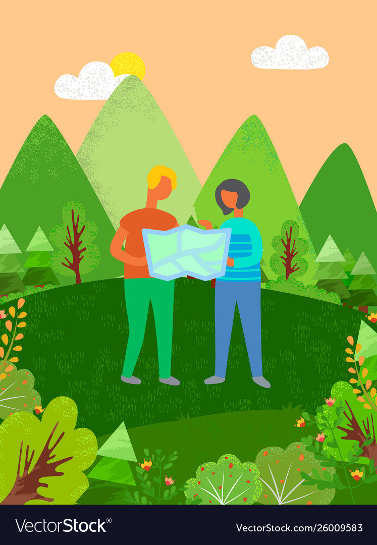 People looking at map finding their way in forest